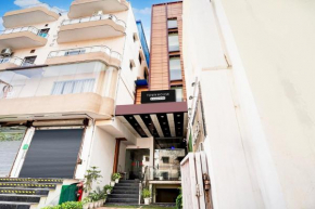 Townhouse Ram Katora Near Vishwanath Temple formerly SV Grand